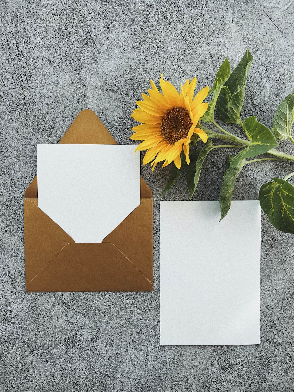 Stack of printed envelopes on a desk