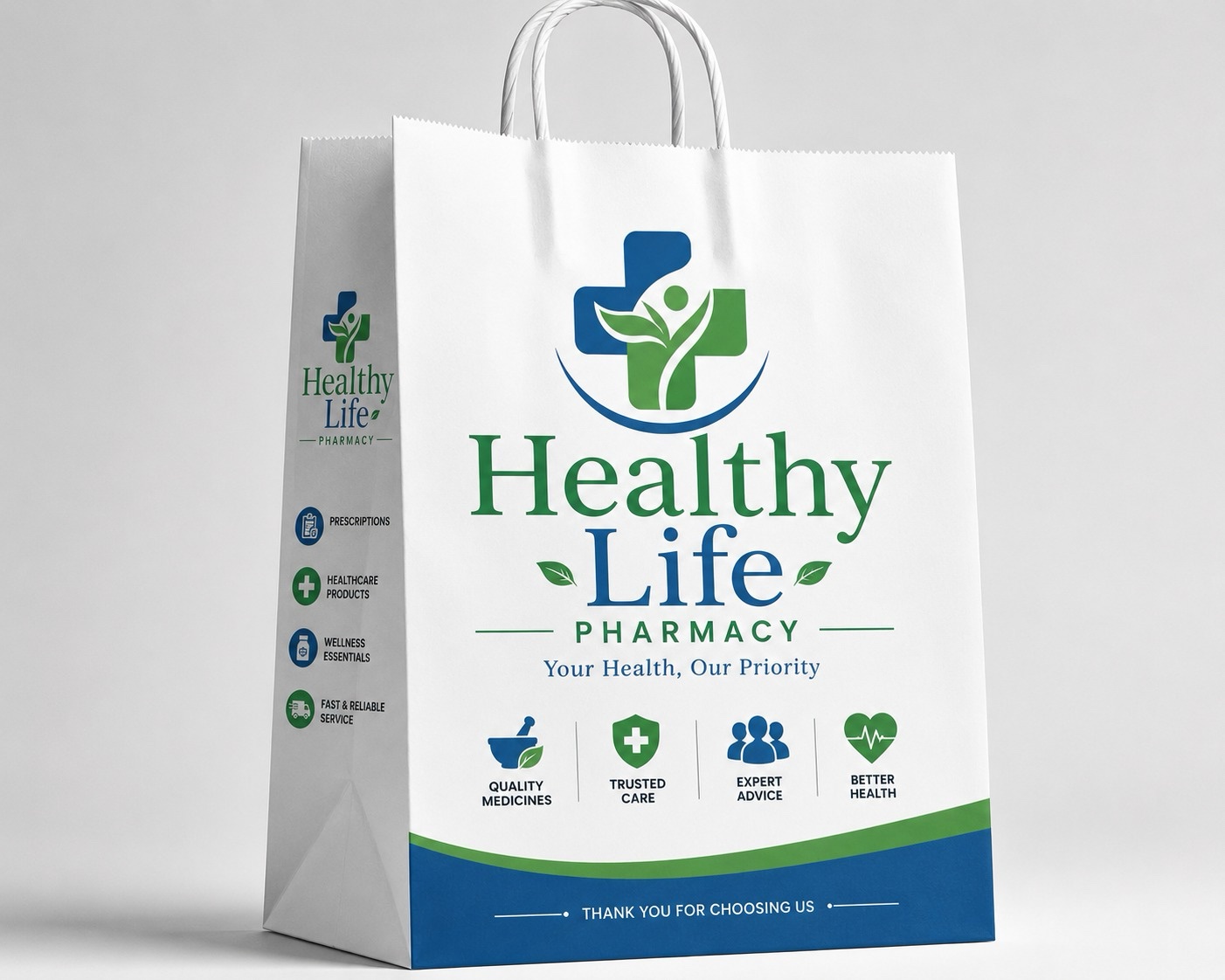 White pharmacy carry bag printed with a Healthy Life Pharmacy sample design — logo, service icons, and trust badges